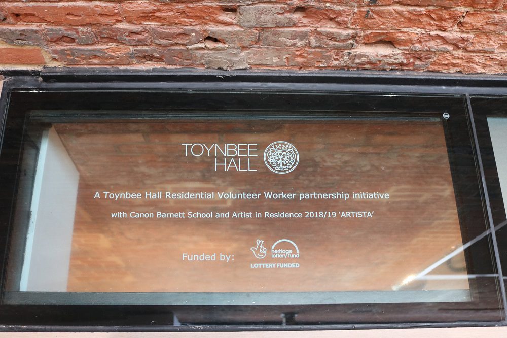 Glass Plaque commemorating the project and partnership between Toynbee Hall and Canon Barnett Primary school 