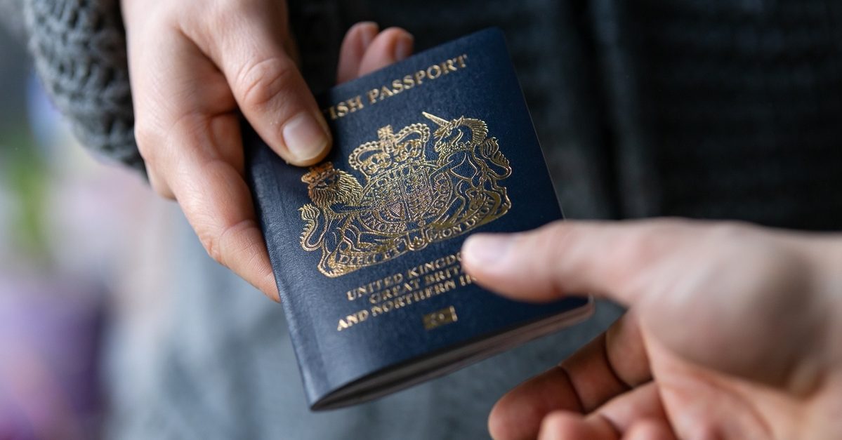 Person handing over passport